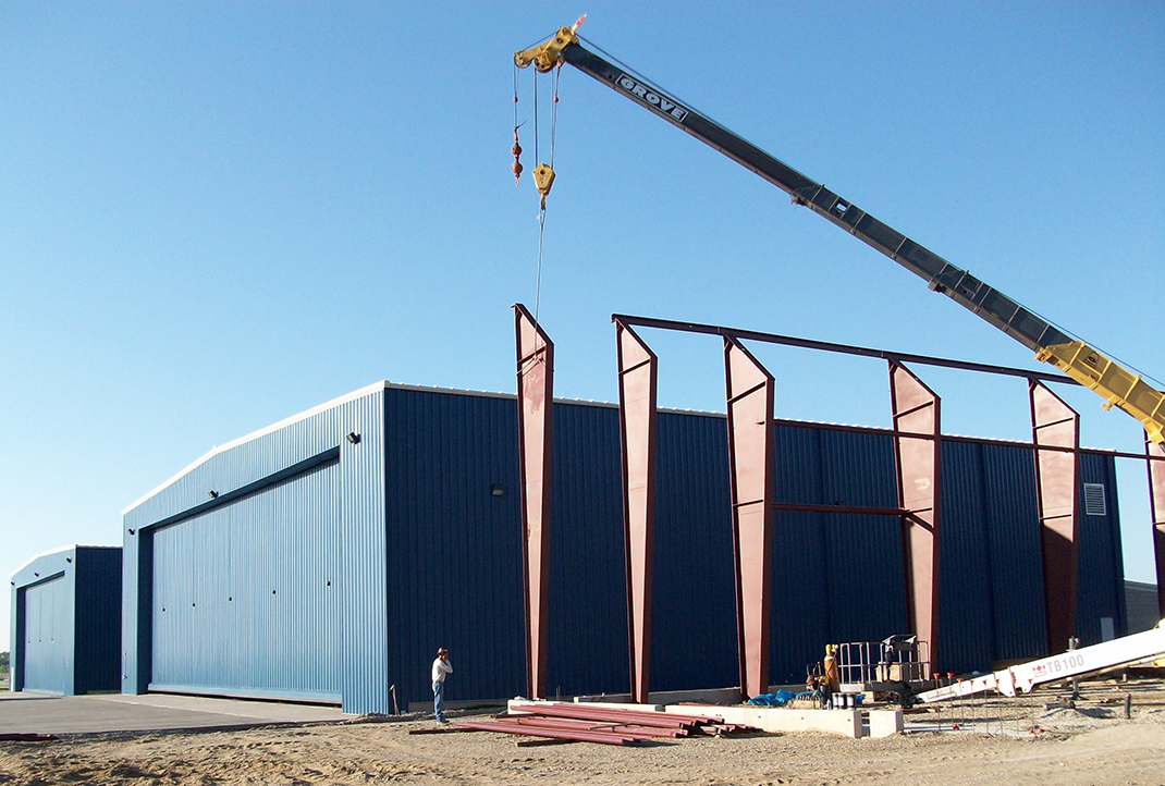 Outdoor View of Airport Hangar Construction by M3 Construction Solutions